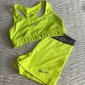Lime green Nike sports bra and matching spandex shorts. Bra size S Shorts M.